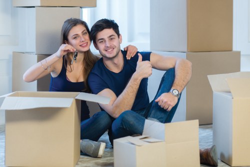 Professional removals in Northkensington with moving van and packed boxes