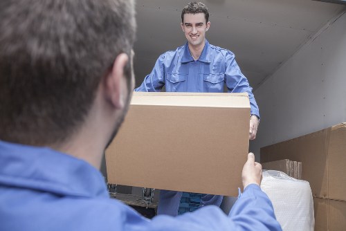 Removal team loading boxes for a North Kensington move