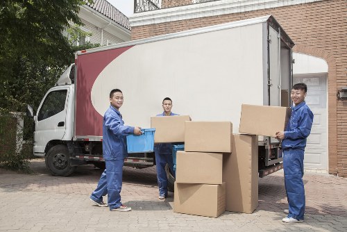 Planning home moves in Northkensington with packed boxes and moving van