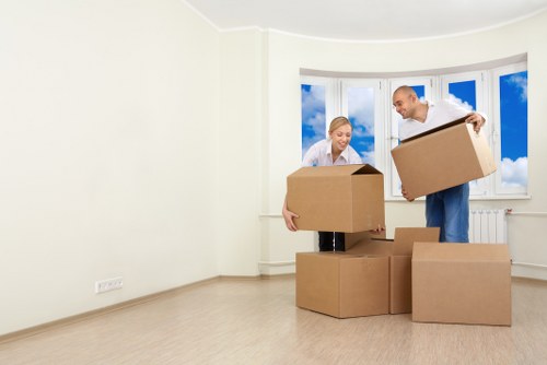 Household moving support with furniture and boxes in North Kensington