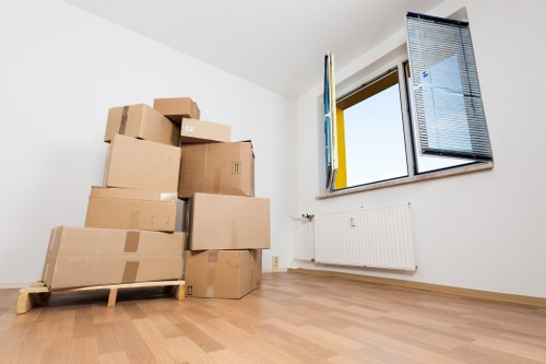 Packed moving boxes ready for a removal van service