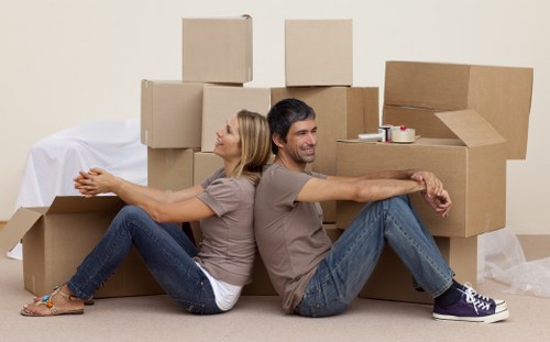 Staff preparing workstations and IT assets for office removals in Northkensington