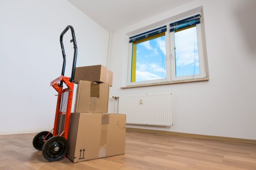 Loading household items onto a removals van in Northkensington