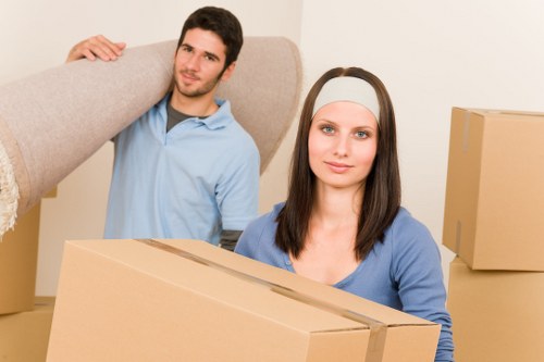 Professional office relocation team preparing furniture for a Northkensington move