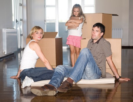 Removals van and movers coordinating access for a North Kensington apartment move