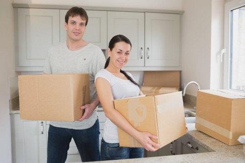 Commercial office relocation setup with labeled boxes and desks in Northkensington
